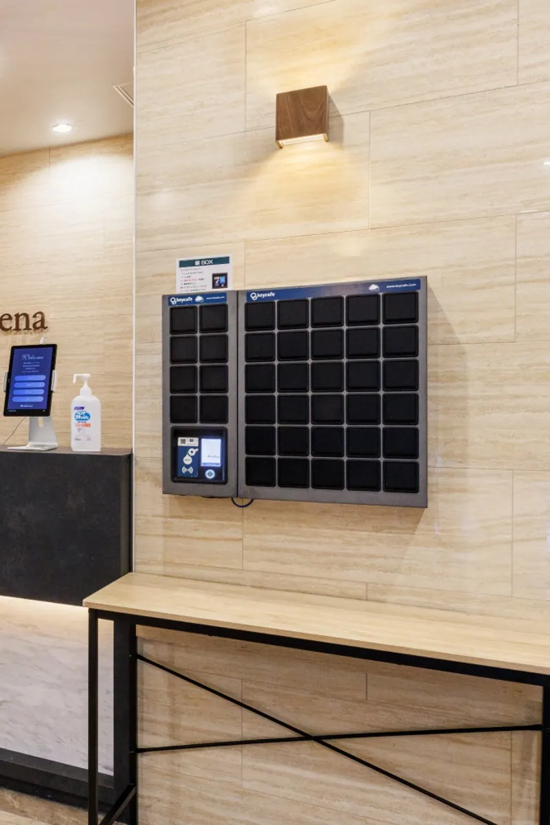 Two Keycafe SmartBoxes wall-mounted in the Hotel Gran Arena lobby