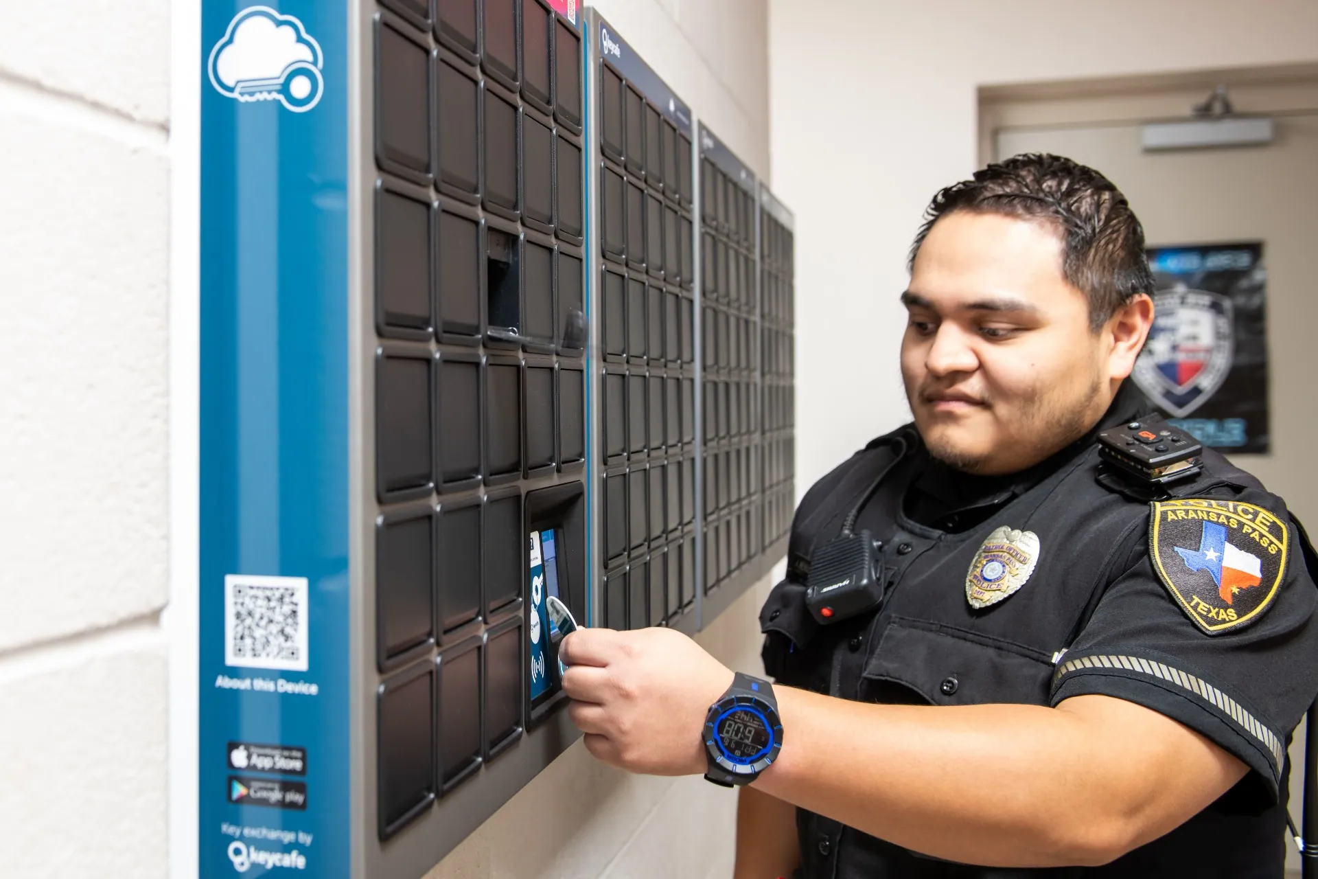 Aransas Pass PD officer scanning a Keycafe fob at the SmartBox