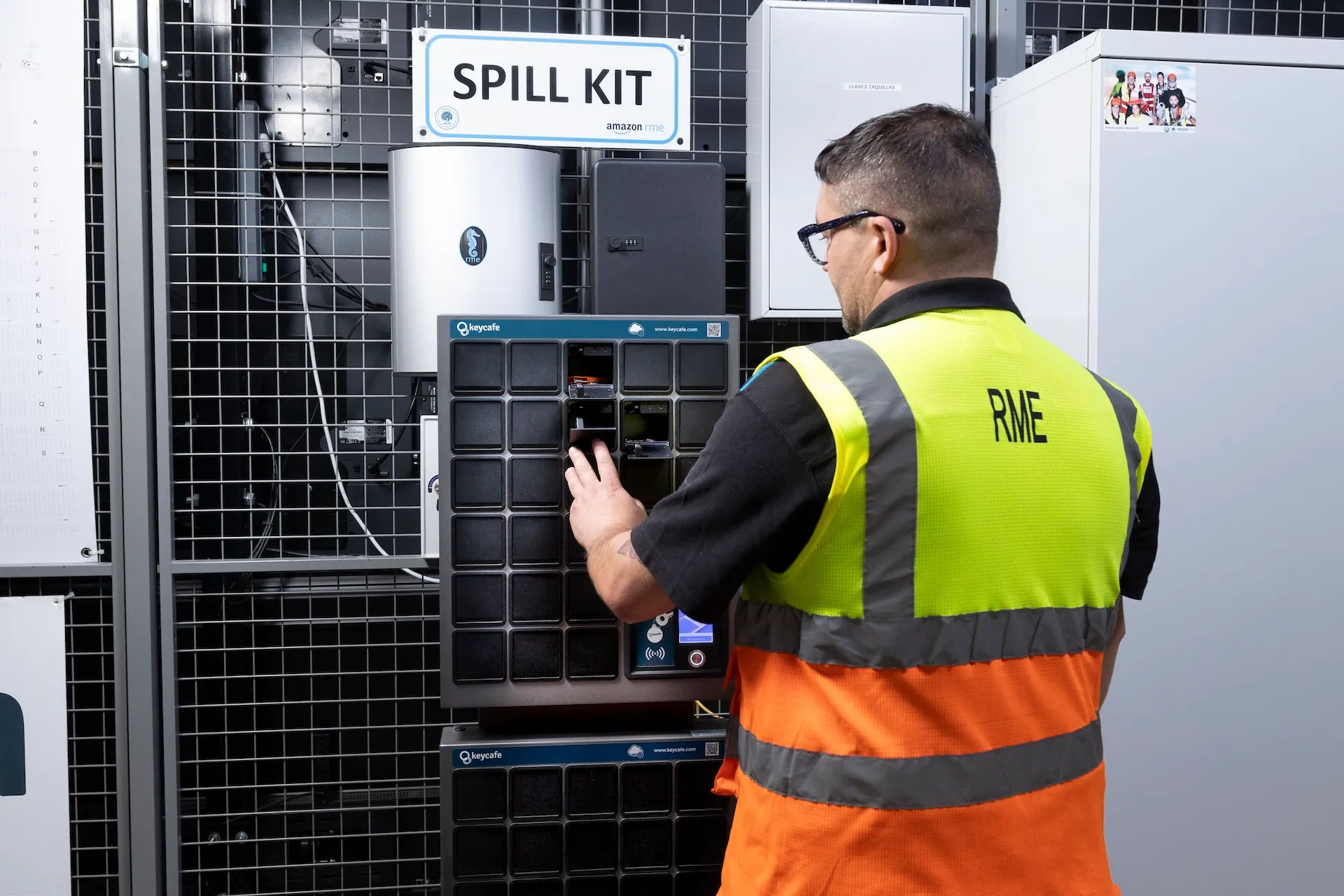 RME Facilities Technician Bruna Miras closing a SmartBox bin