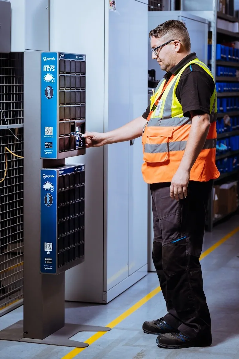 Amazon employee in a high-vis vest using the SmartBox inside a warehouse