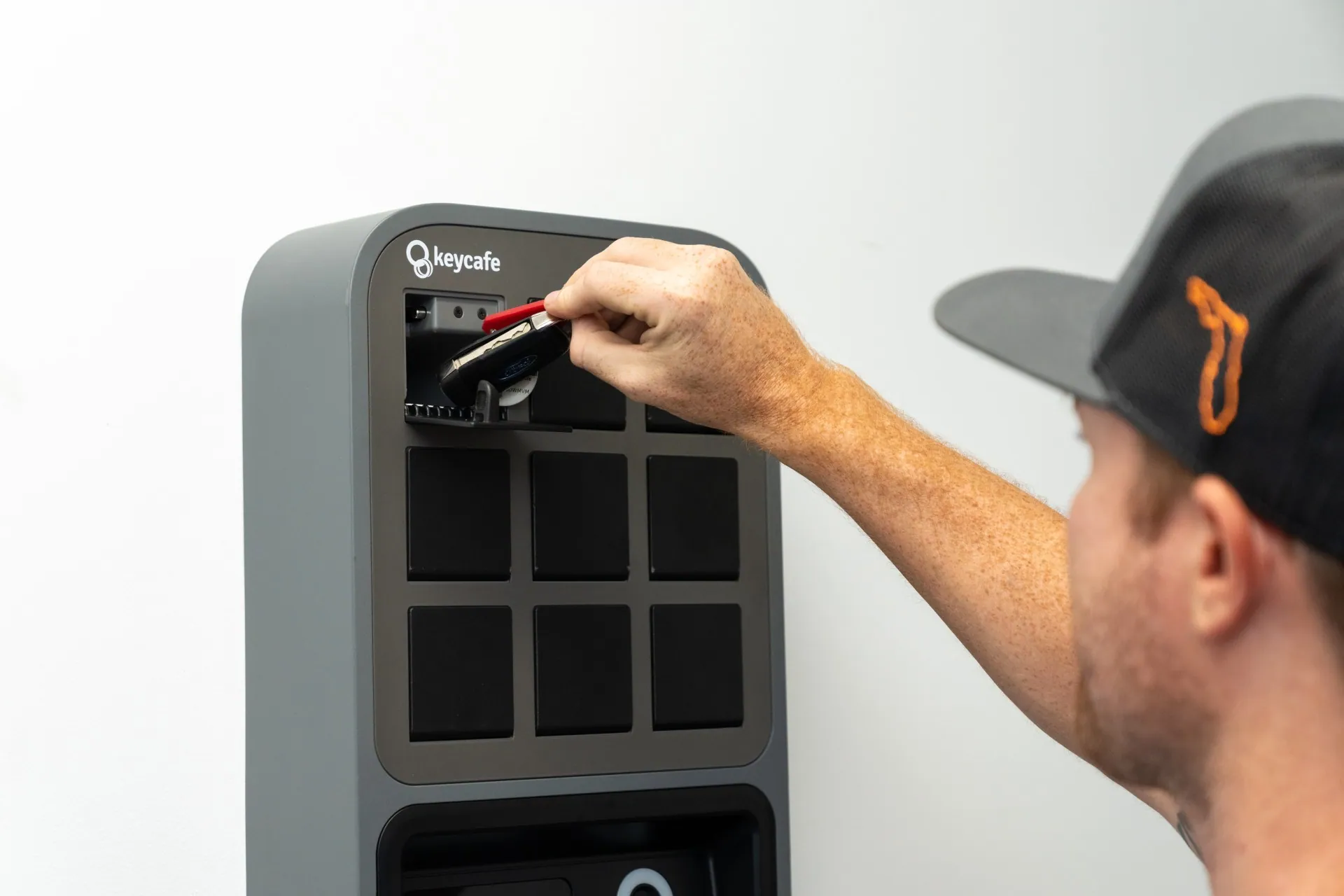 SunVena Solar staff member taking keys from a SmartBox bin
